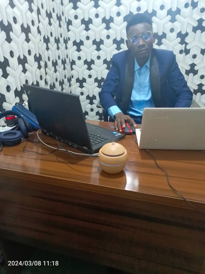 Michael sitting in an office environment