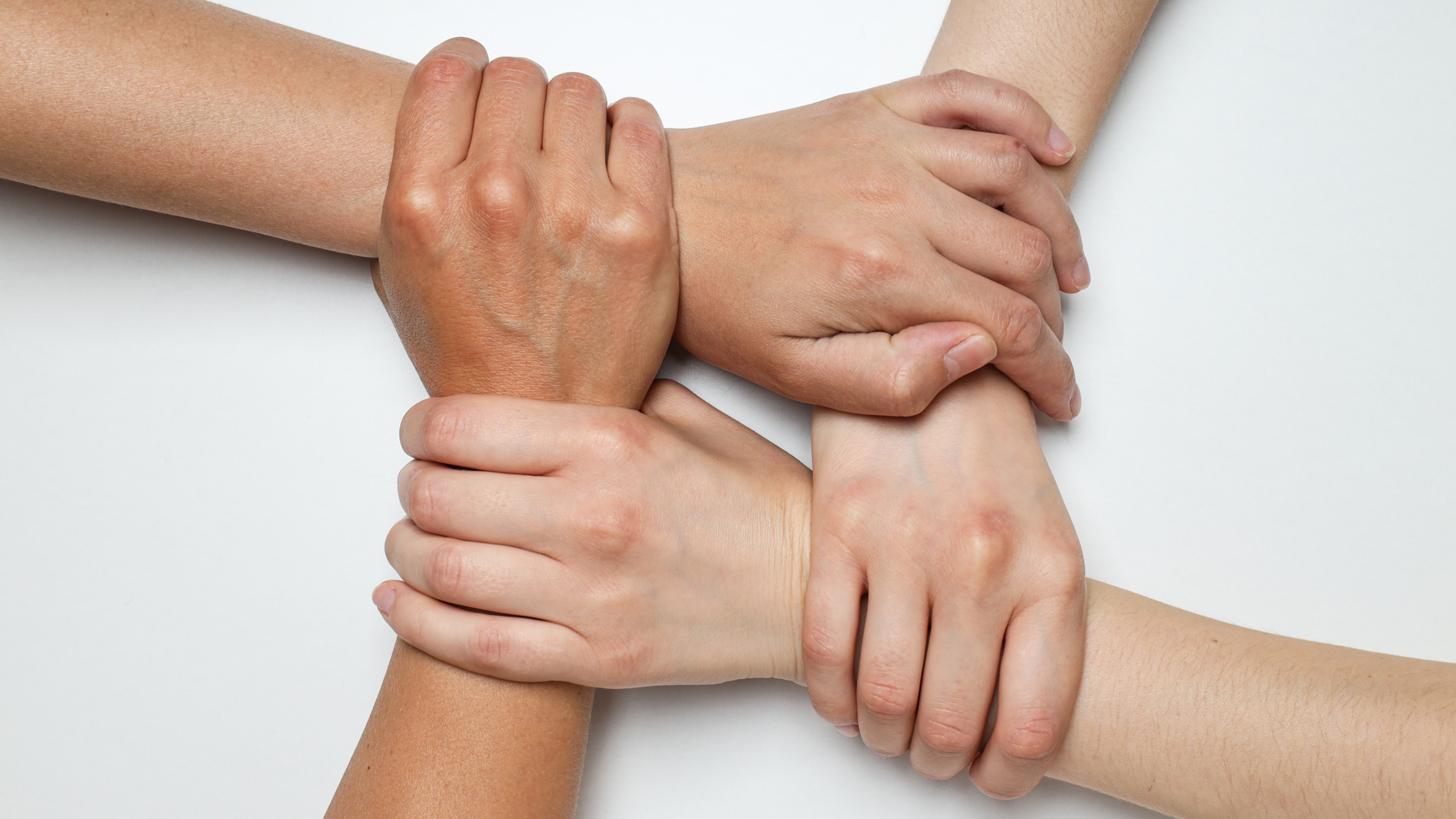Boards holding hands to build a world class company culture