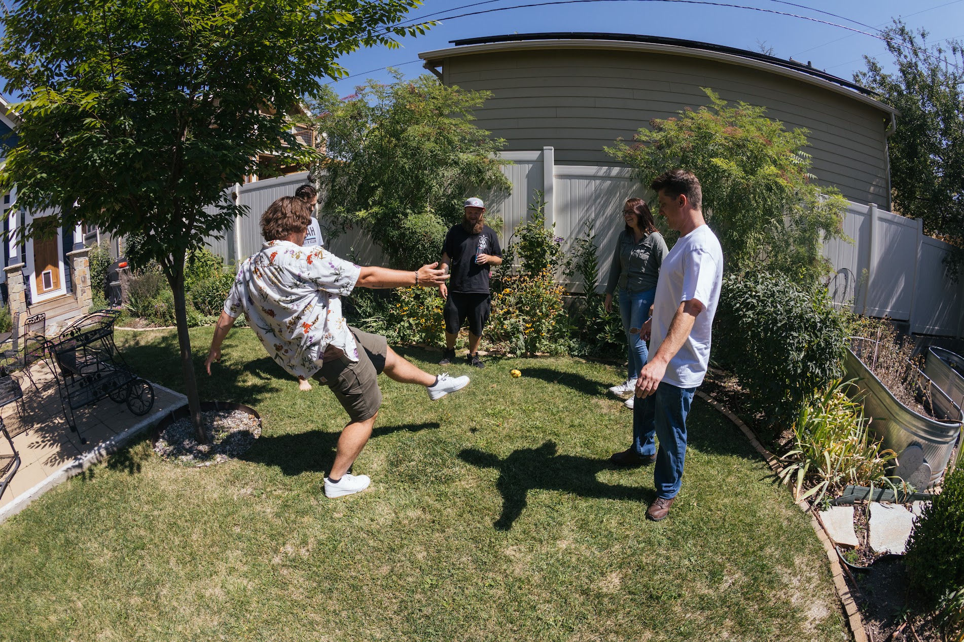 group of people in recovery playing hacky sack. 