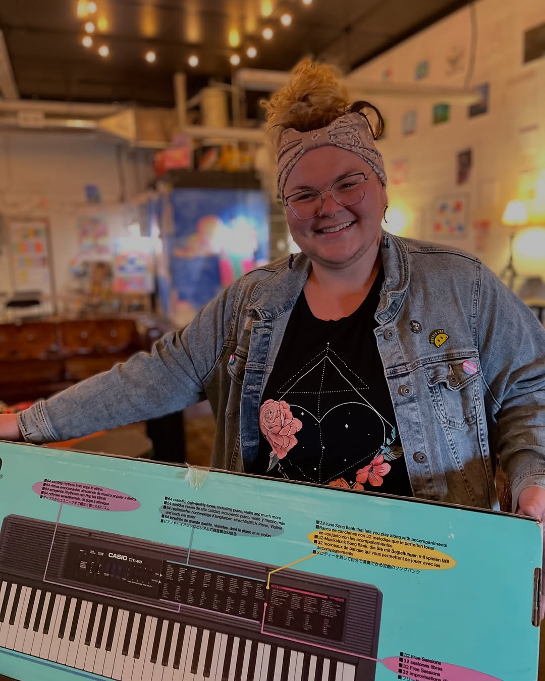woman holding a keyboard