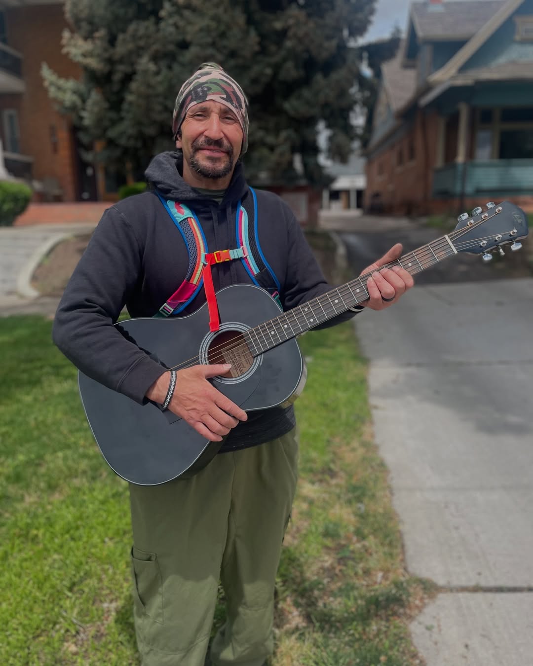 man holding a guitar