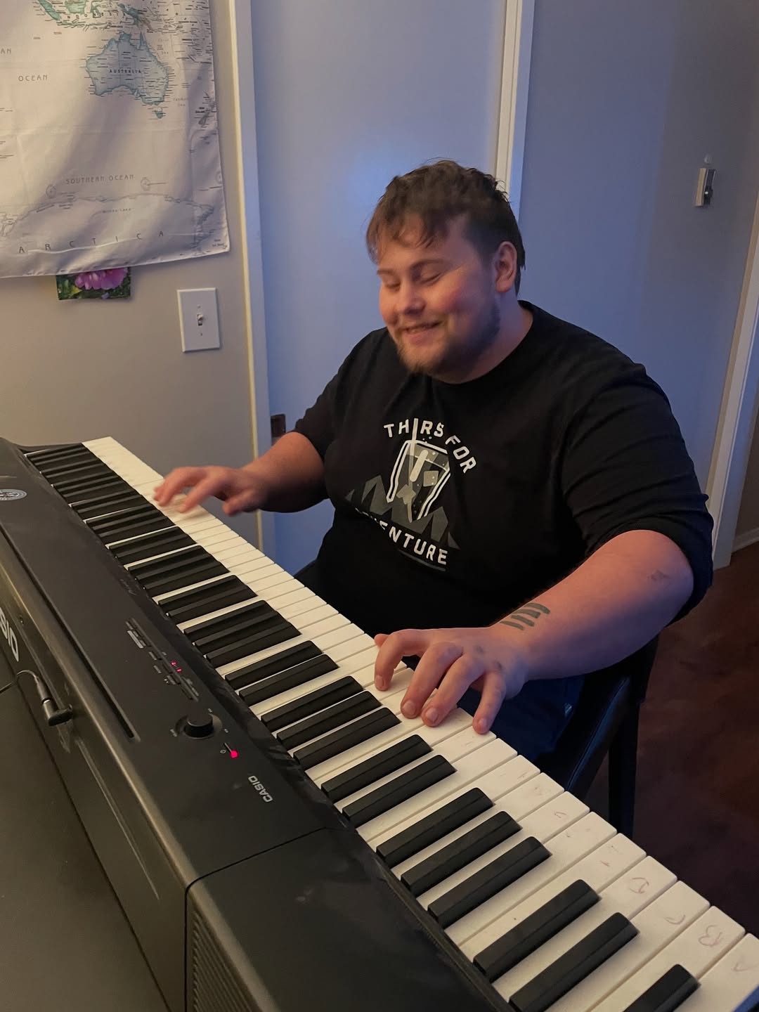 man playing the keyboard