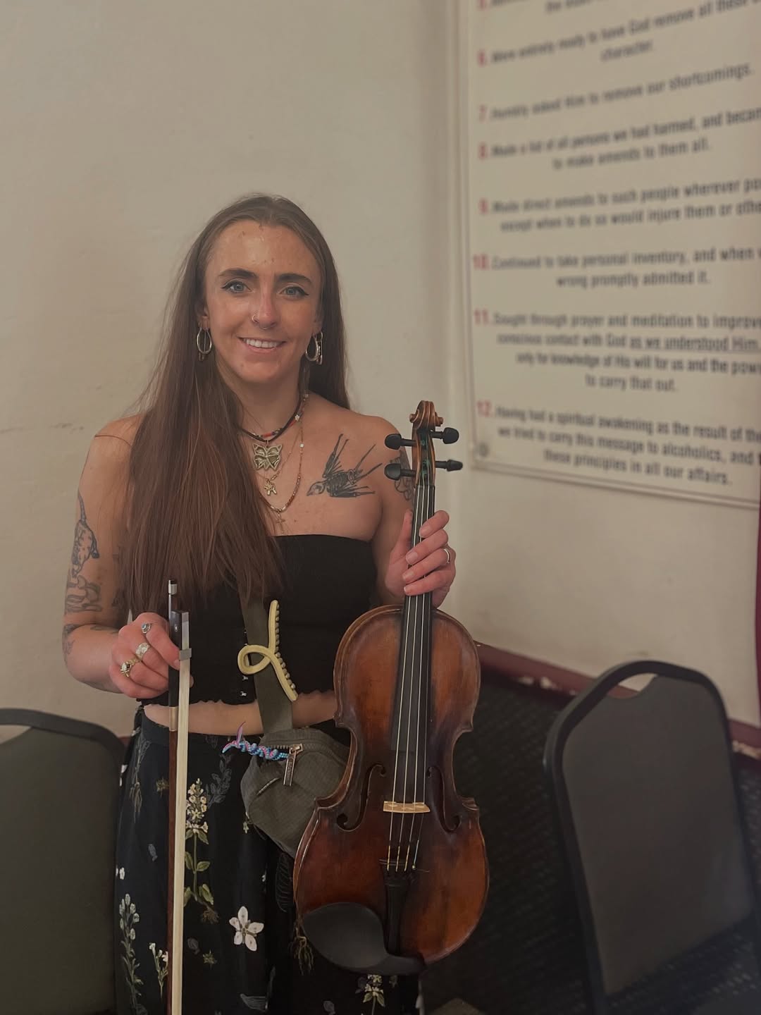 woman holding violin