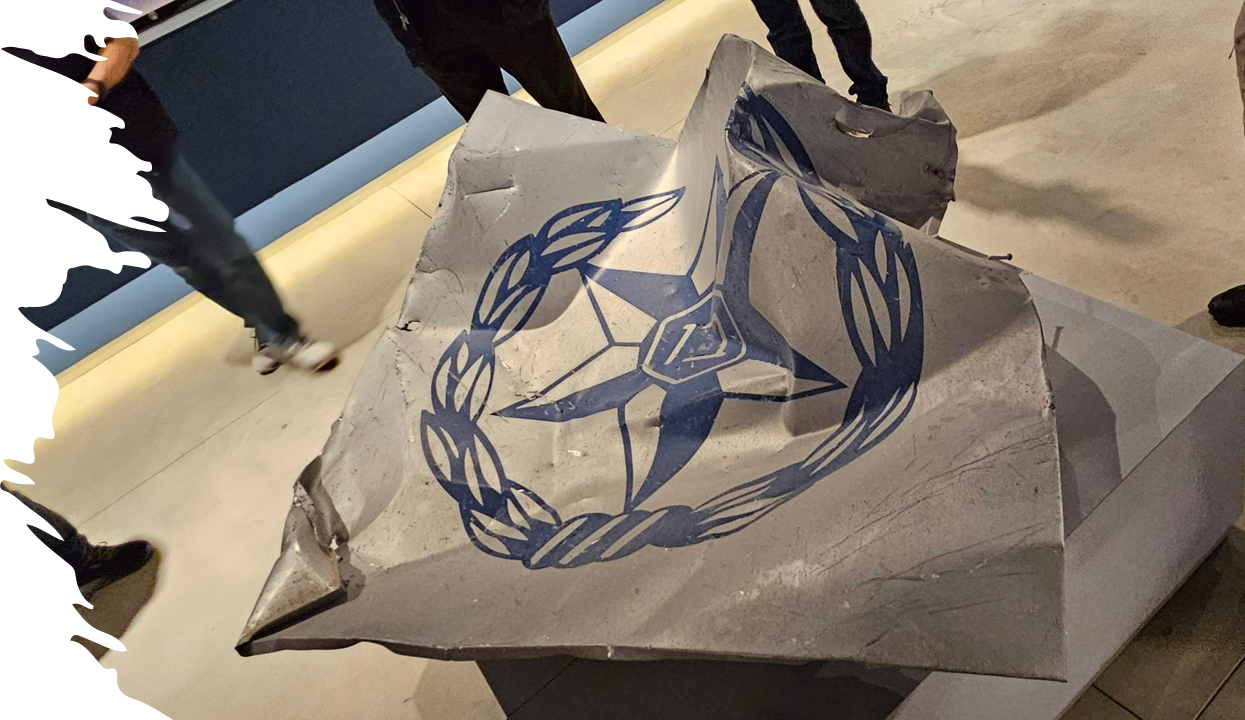 The Israel National Police insignia from the destroyed Sderot Police Station, now preserved at the Police Academy Museum until a new station is rebuilt — a powerful symbol of resilience.