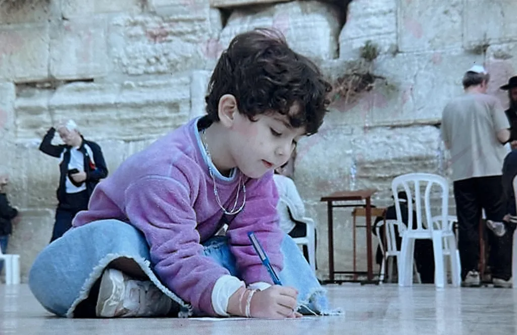 Five-year-old Rose Lubin at the Western Wall in Jerusalem