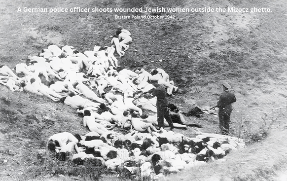 A German police officer shoots wounded Jewish women outside the Mizocz ghetto. Eastern Poland October 1942