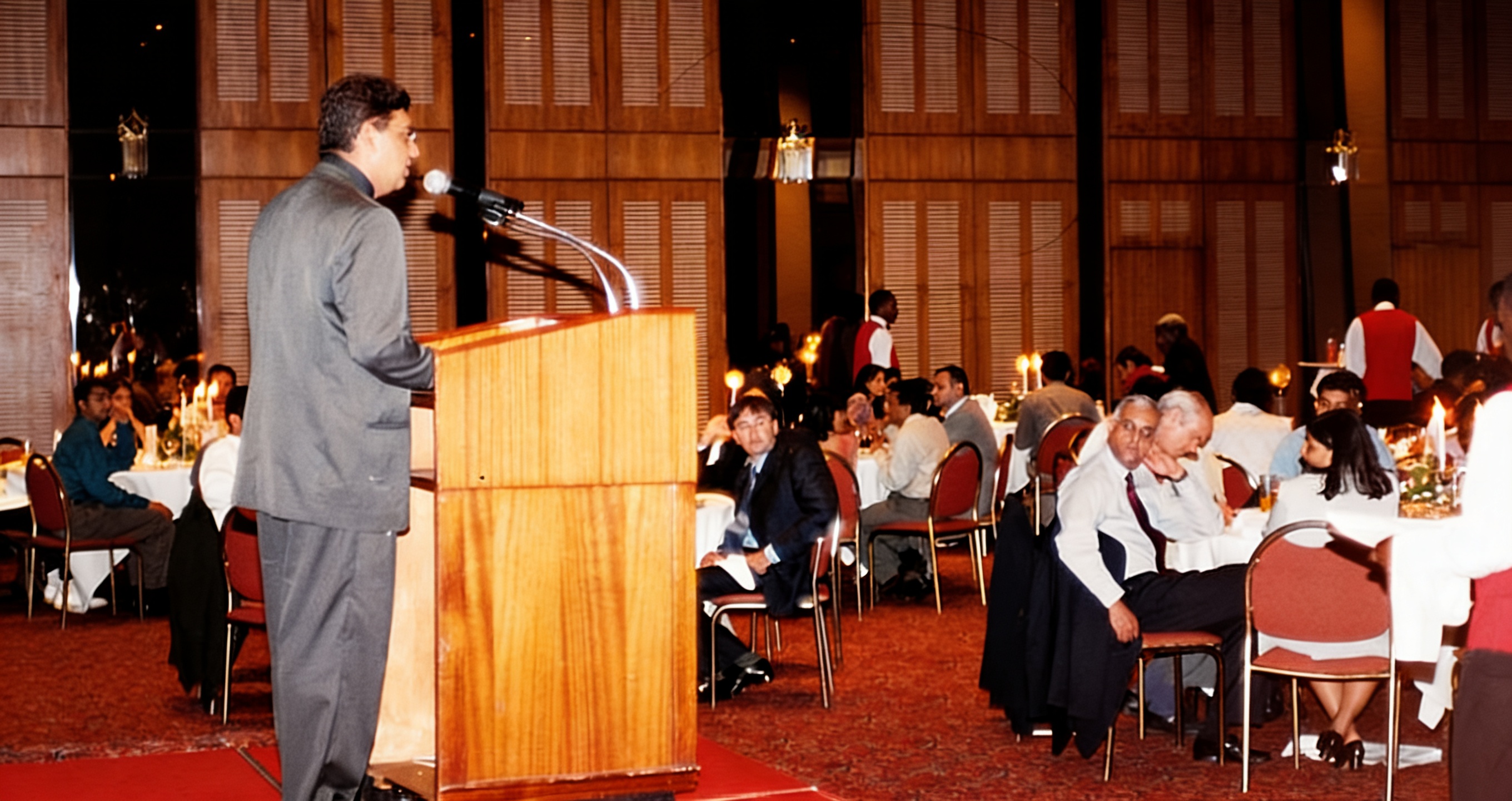 Vijay Mistri delivering keynote to large conference audience