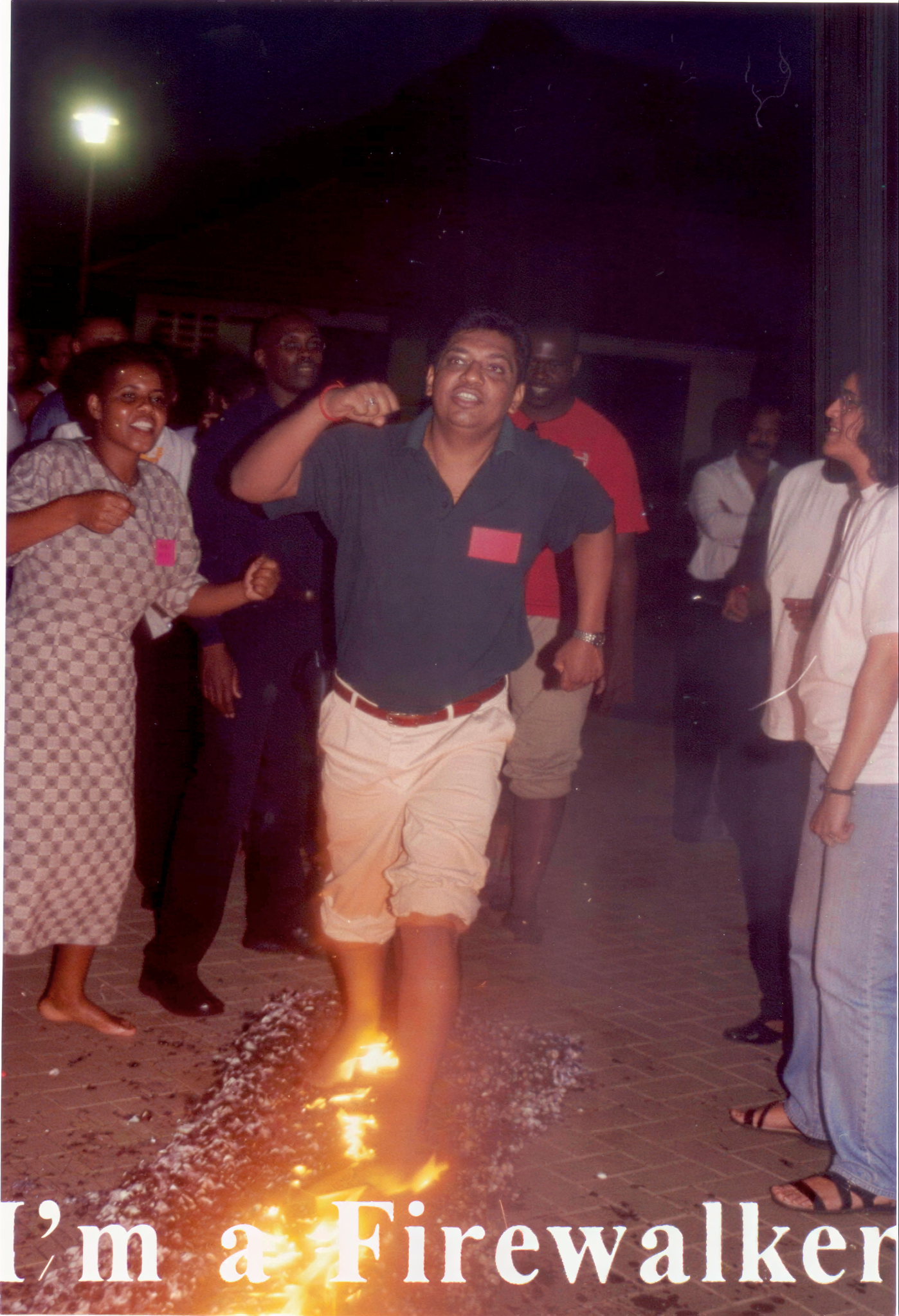 Vijay Mistri completing firewalk challenge demonstrating leadership mindset mastery