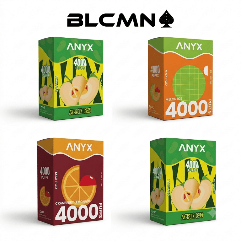 Studio 3D product photography of four flavor-specific Anyx Max 4000 puffs pod packaging boxes arranged in a 2x2 grid on a clean white background, all branded with the BLCMN marketplace logo at the top right. The top-left box is green for Apple Ice, featuring graphic apples. The top-right box is orange for Melon Ice, featuring a graphic melon. The bottom-left box is deep red/maroon for Cranberry Lemonade, featuring a graphic citrus slice. The bottom-right box is an identical duplicate of the green Apple Ice box from the top-left. All packaging is sealed and clearly displays the 'Anyx' brand and '4000 Puffs' text.