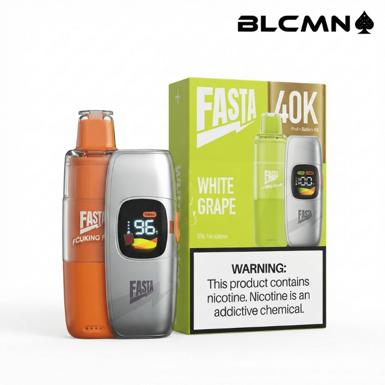Studio 3D product photography of the FASTA 40K pod and battery kit featuring an orange and silver modular vape device standing vertically on the left with a bright digital display, next to its matching orange flavor packaging box on a clean white background, branded with the BLCMN marketplace logo at the top right corner.