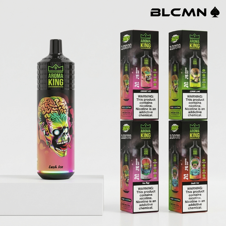 A high-resolution 3D studio render on a white background showing a black Aroma King Dark Knight disposable vape device with colorful skull graphic artwork standing upright on a white platform, next to four matching flavor boxes arranged in a two-by-two grid on the right, all beneath the BLCMN spade logo in the top right corner.